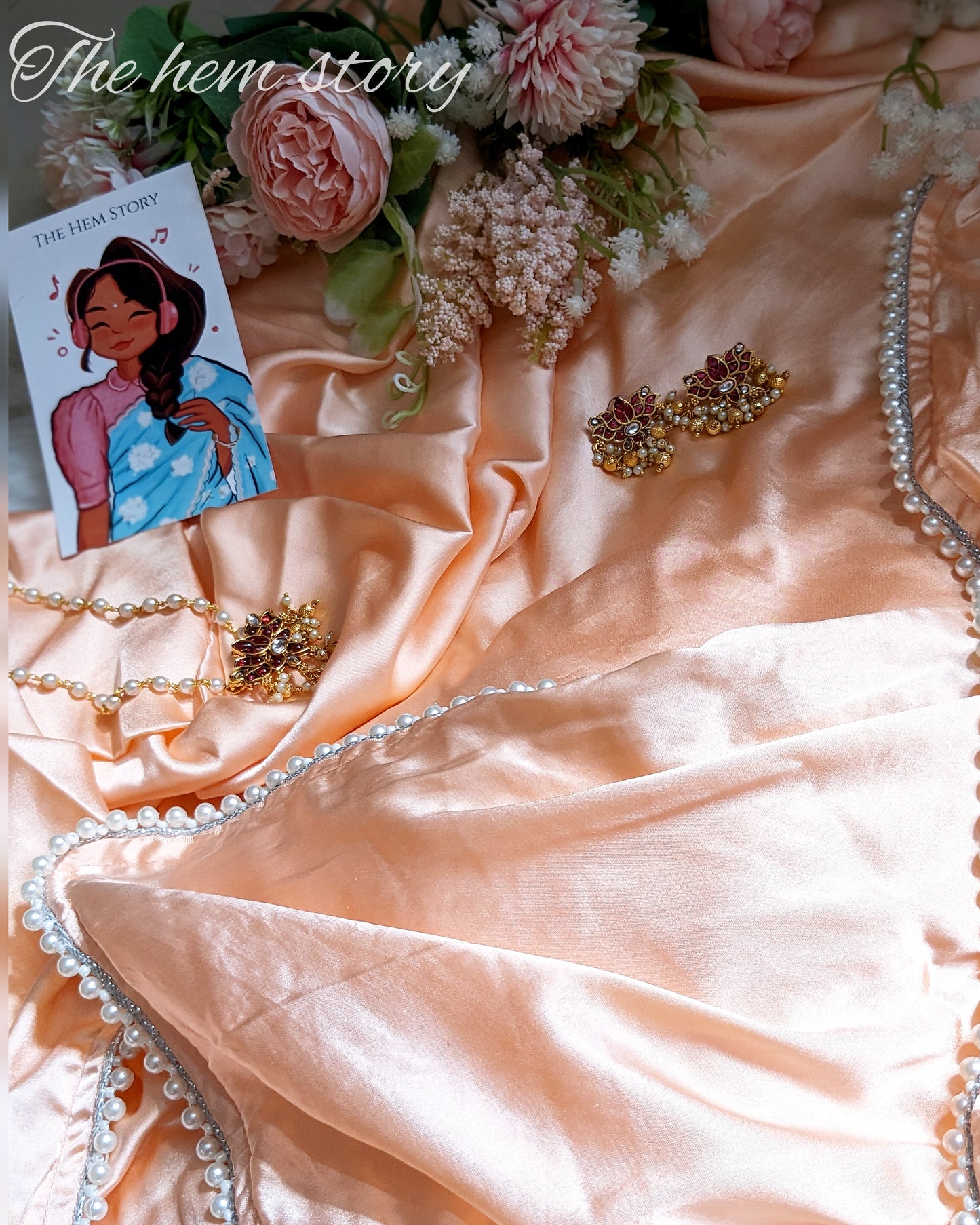 JASHN -Pastel Orange Satin Saree With Inticate Pearl Borders
