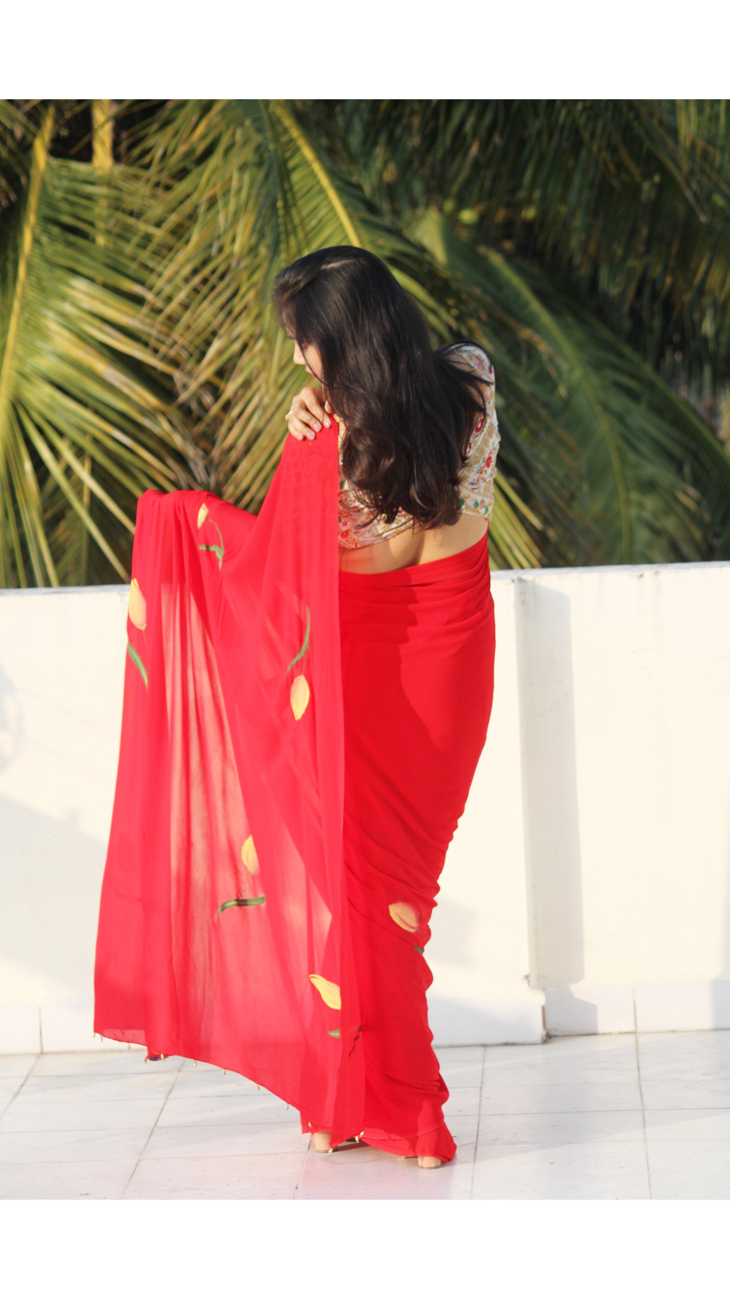 CHITRAKARI- red tulip handpainted saree paired with off white embellished blouse