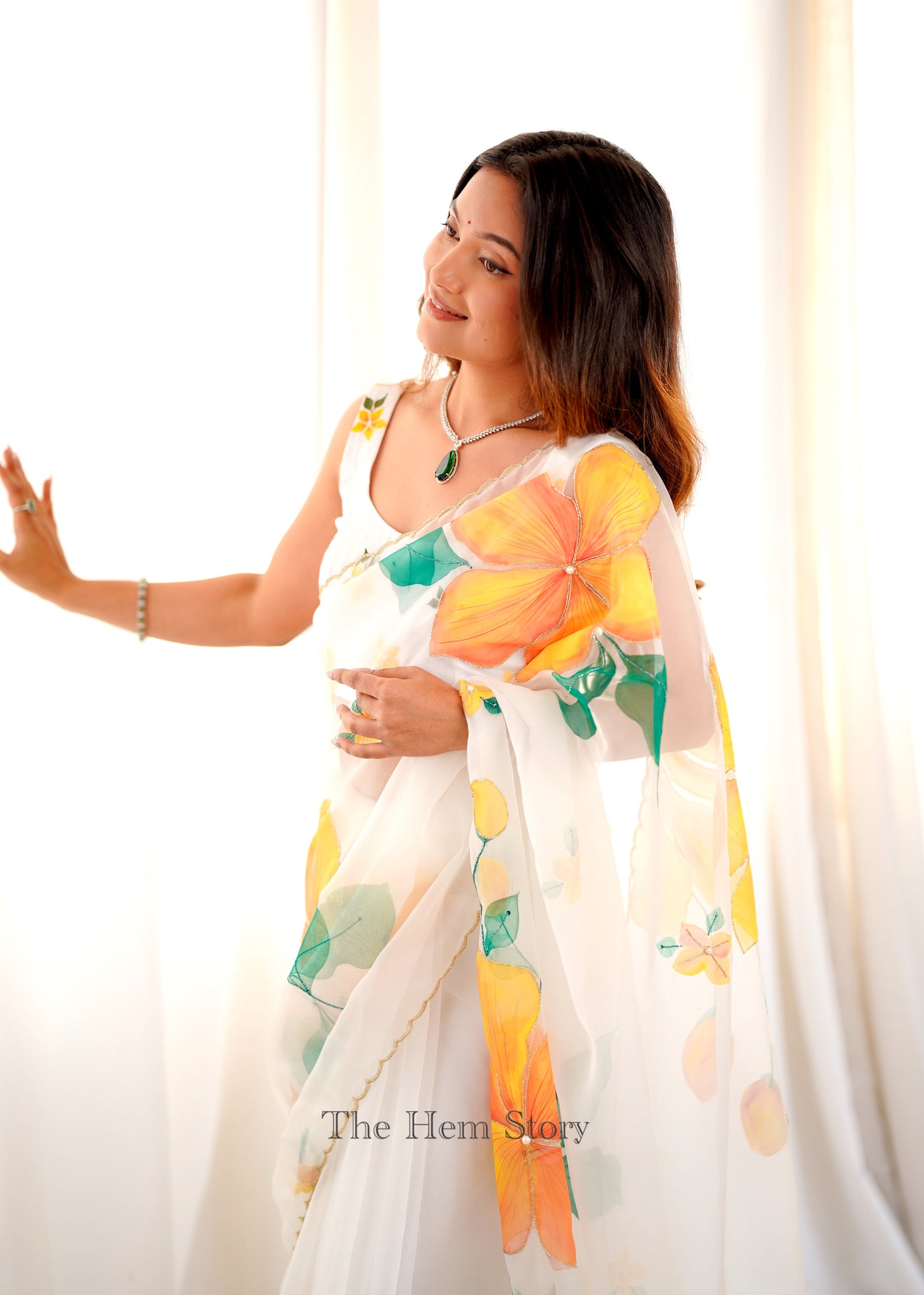White Handpainted Organza Saree Enhanced with handwork