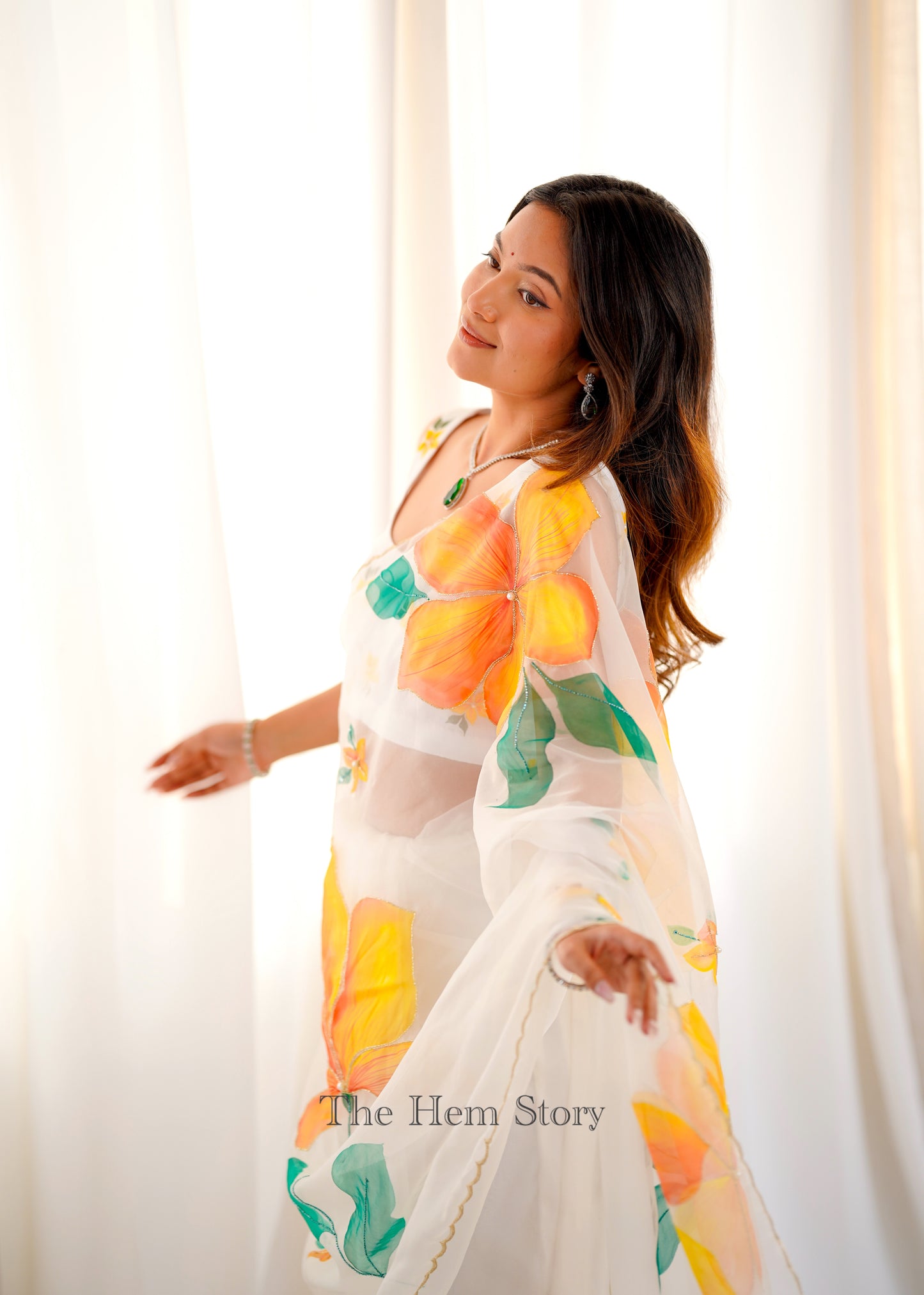 White Handpainted Organza Saree Enhanced with handwork