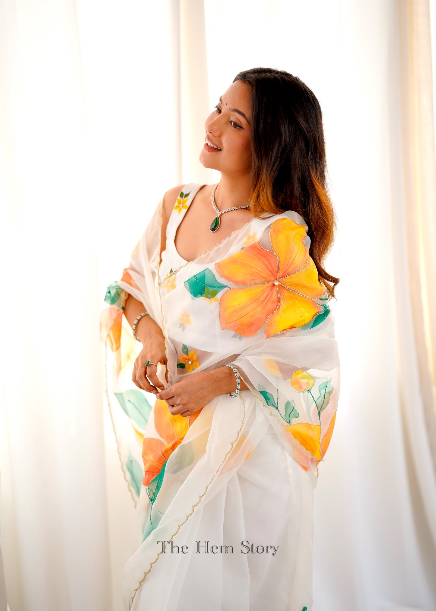 White Handpainted Organza Saree Enhanced with handwork