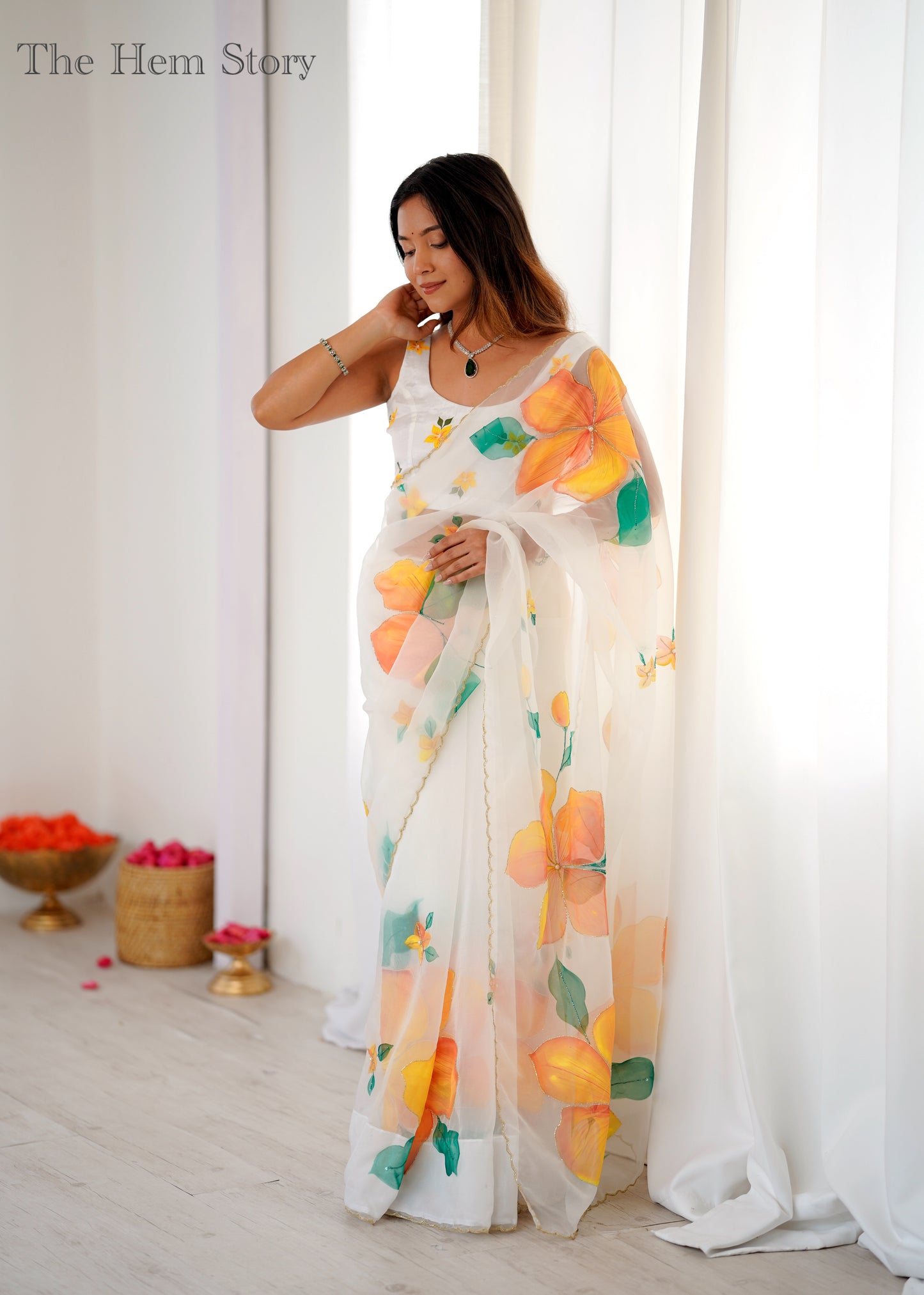 White Handpainted Organza Saree Enhanced with handwork