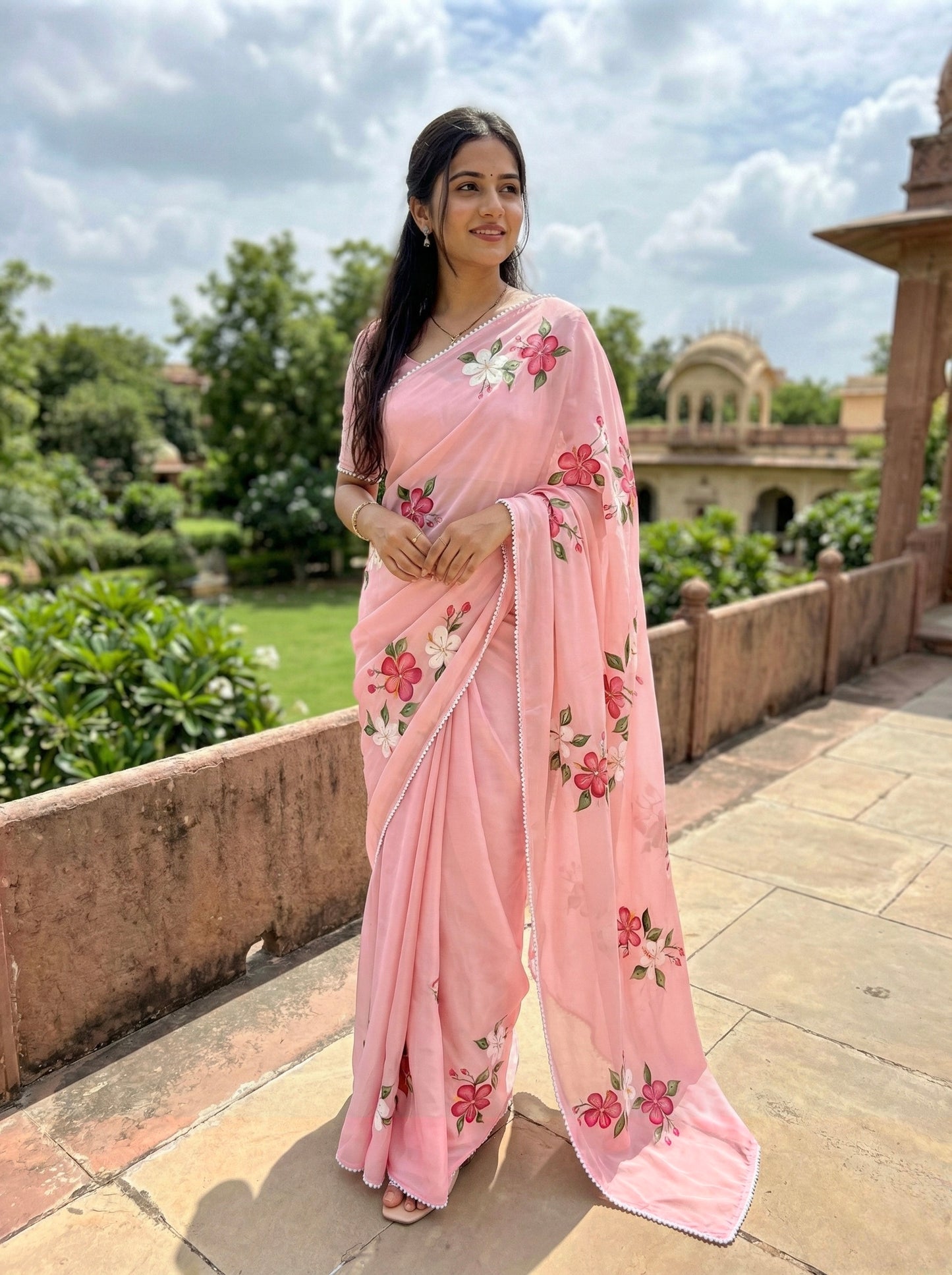 Baby Pink Handpainted Crape silk Saree Enhanced with handwork